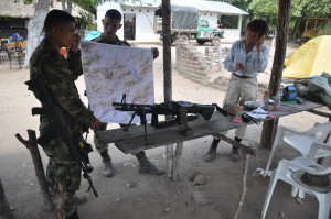 Colombian Government Troops admire the SplashMap that John & team followed