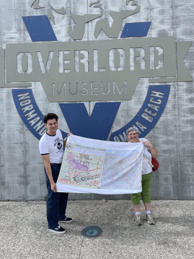 overlord-museum-manager-julien-battlefield-guide-gabrielle