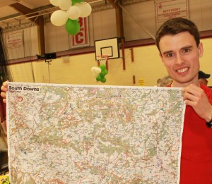 Senior mens winner, Matt Bennett shows off the map